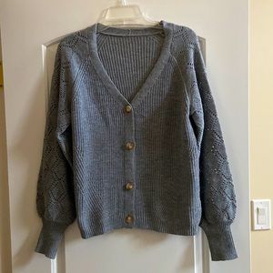 Beautiful light grey button down cardigan in size M